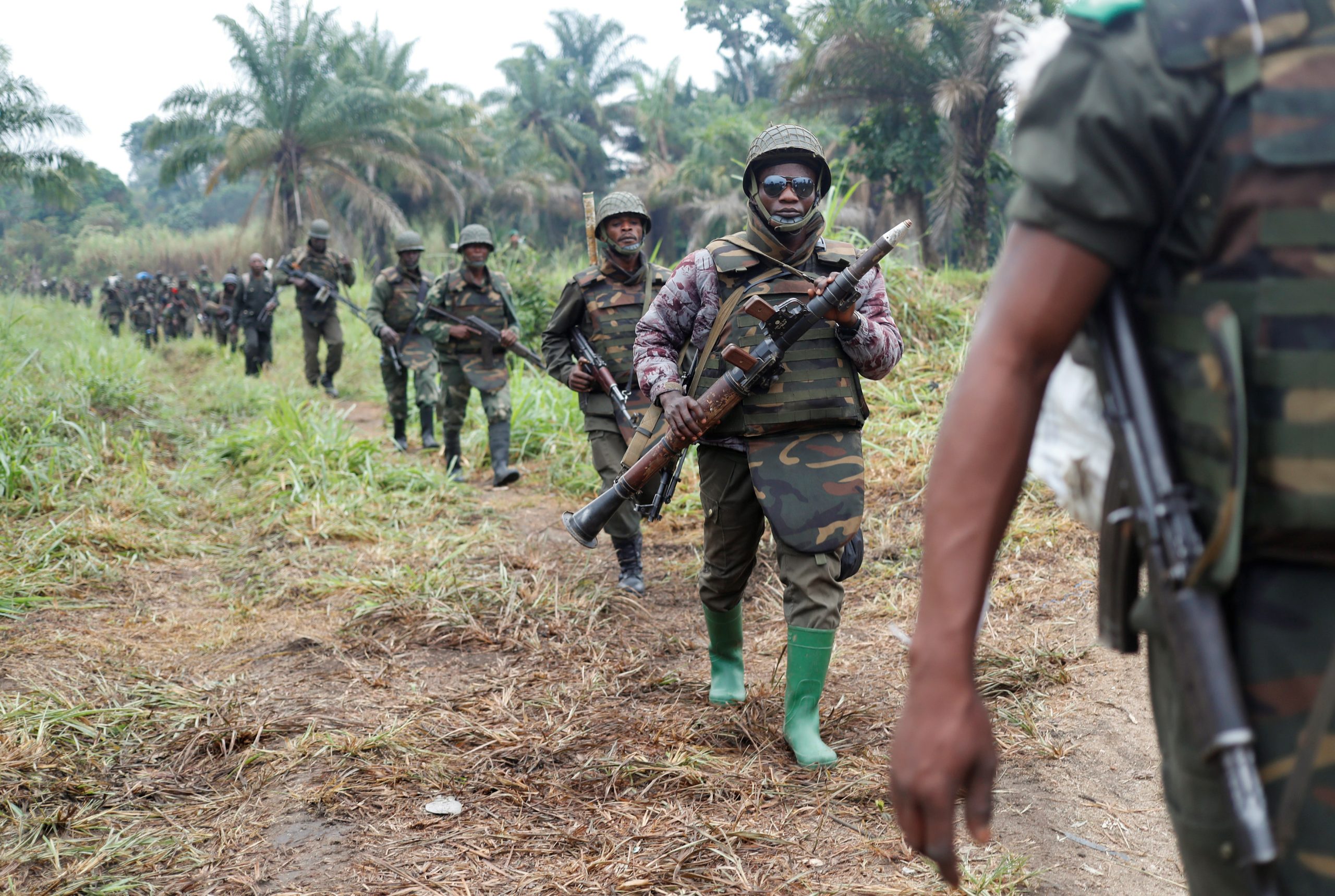 Islamic State-linked militants kill 11, torch vehicles in eastern Congo